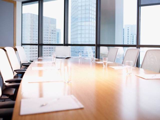 SPAC Boardroom with paperwork on tabletop