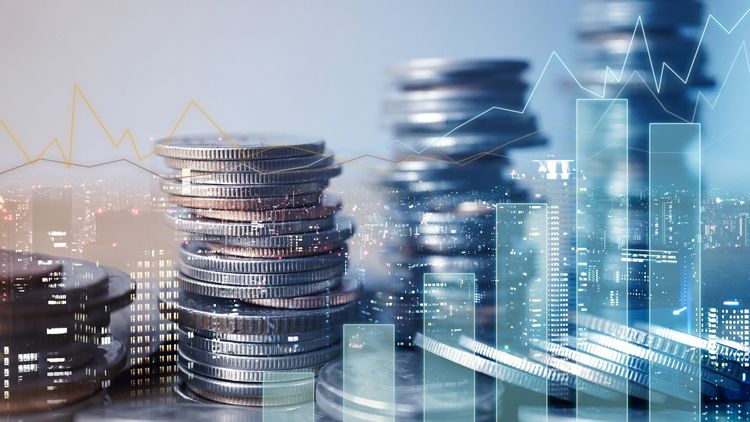 Financial savings overlay on cityscape