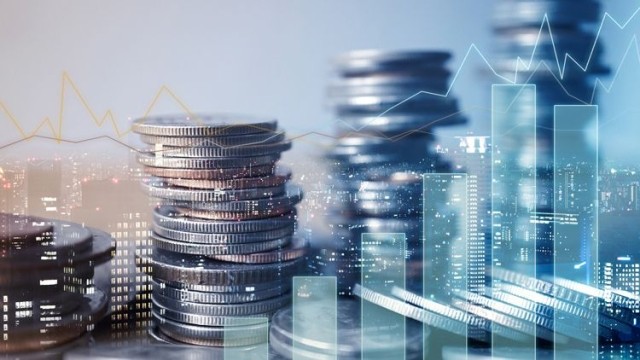 Financial savings overlay on cityscape
