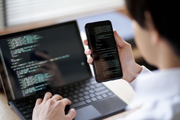 programmer checking the operation of the code