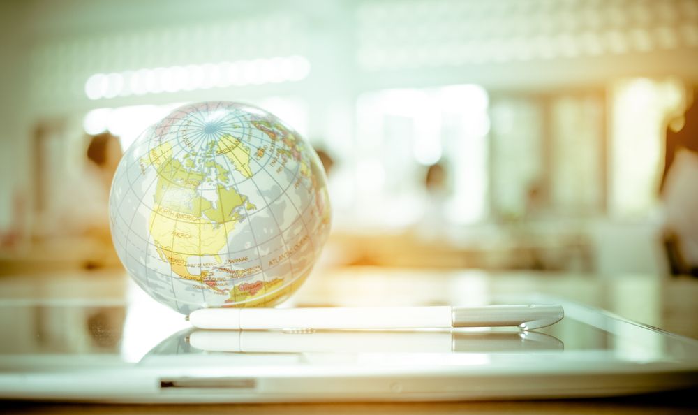 globe with tablet pen