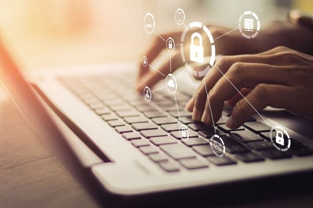 Laptop person cyber ransomware