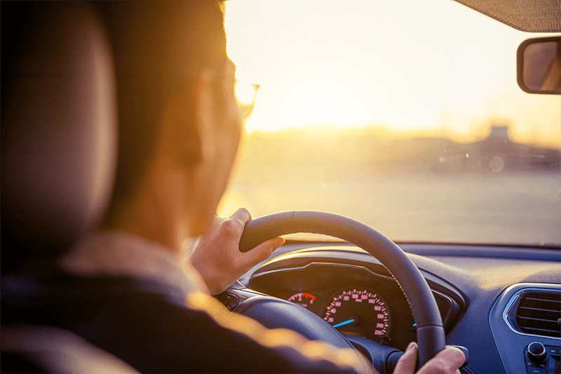 driver looking into the sun